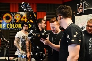 From Ashes To New Signing A Guitar