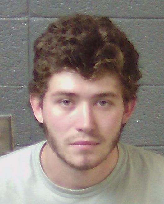 19-year-old Austin Daniel is charged with using counterfeit bills at different stores in Milledgeville.