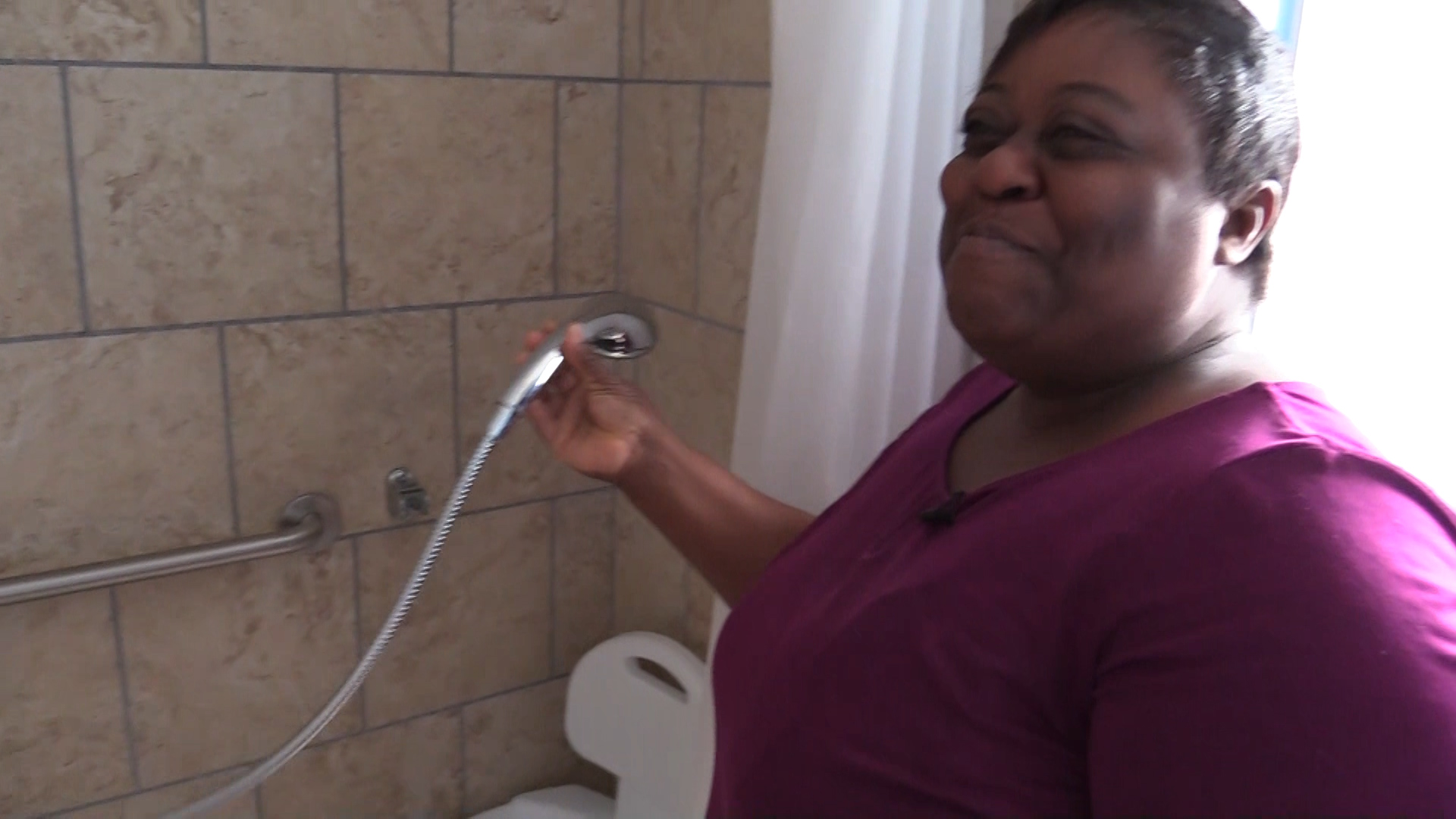 Habitat for Humanity remodels family's bathroom for girl with cerebral