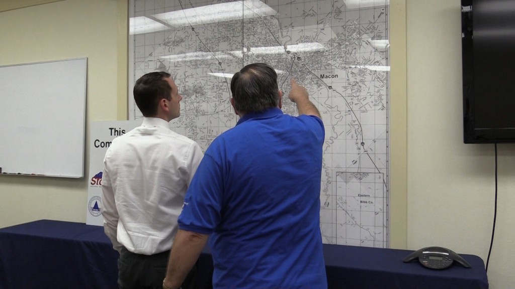 Macon-Bibb EMA Director Spencer Hawkins (left) and Amateur "Ham" Radio Operator Hurb Ingles discuss Severe Weather Preparedness Week.