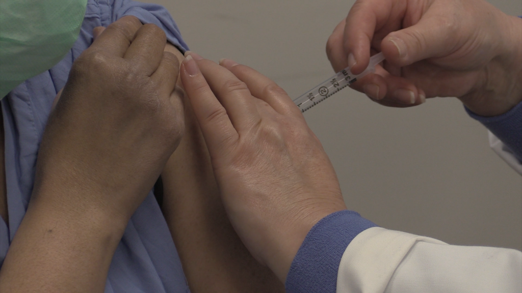 The Moderna Vaccine is administered to the NCHD.