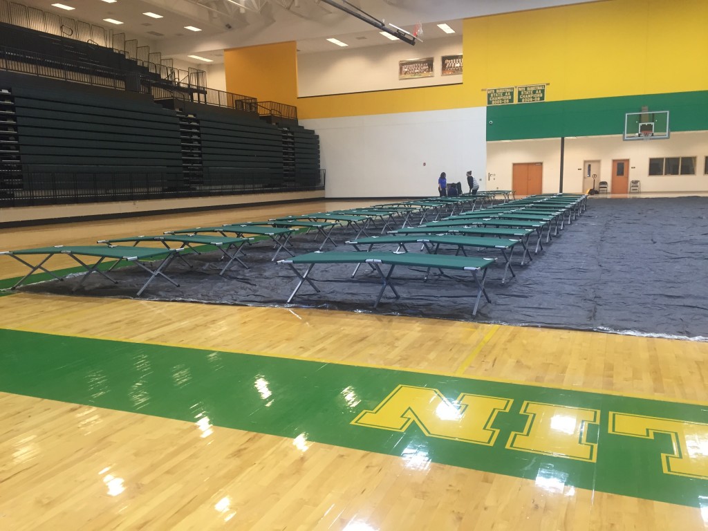 The Red Cross set up tons of cots for people at the Dublin High School Gym Thursday.