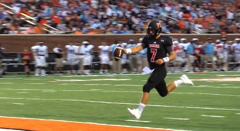 Mercer quarterback John Russ scores a touchdown in the Bears' 24-23 loss to The Citadel Thursday.