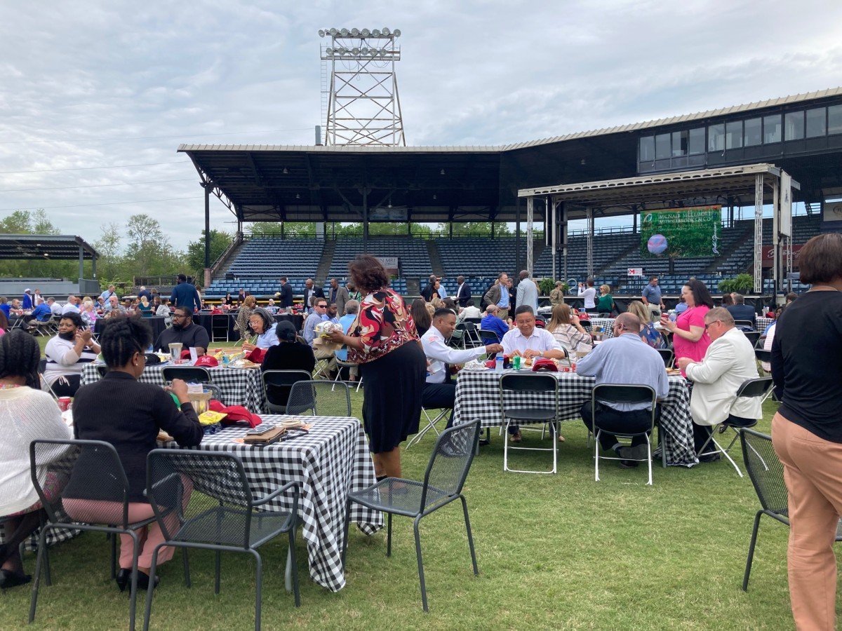 Macon couple gets married at Luther Williams field