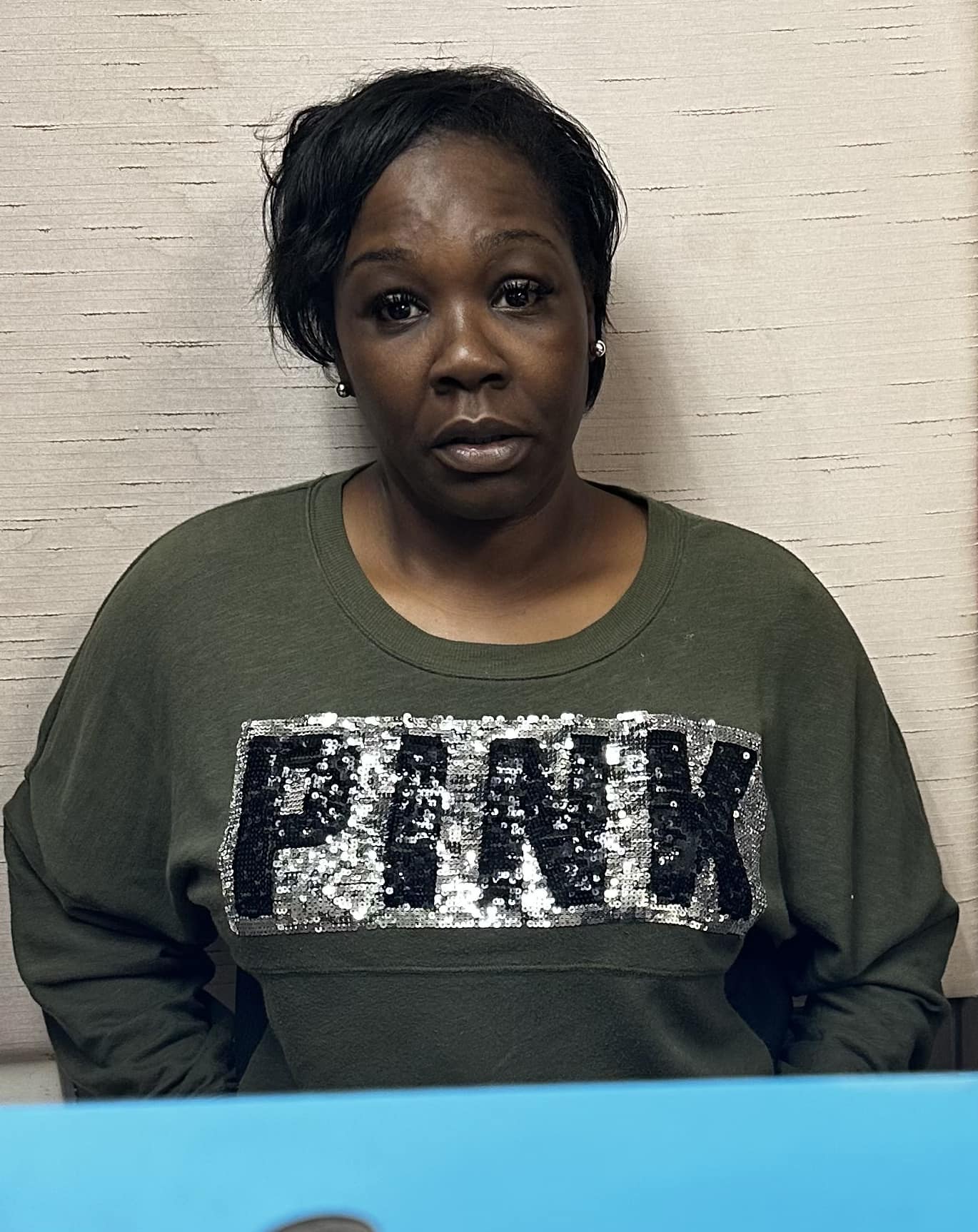 Woman charged with Aggravated Assault, Cruelty to Children