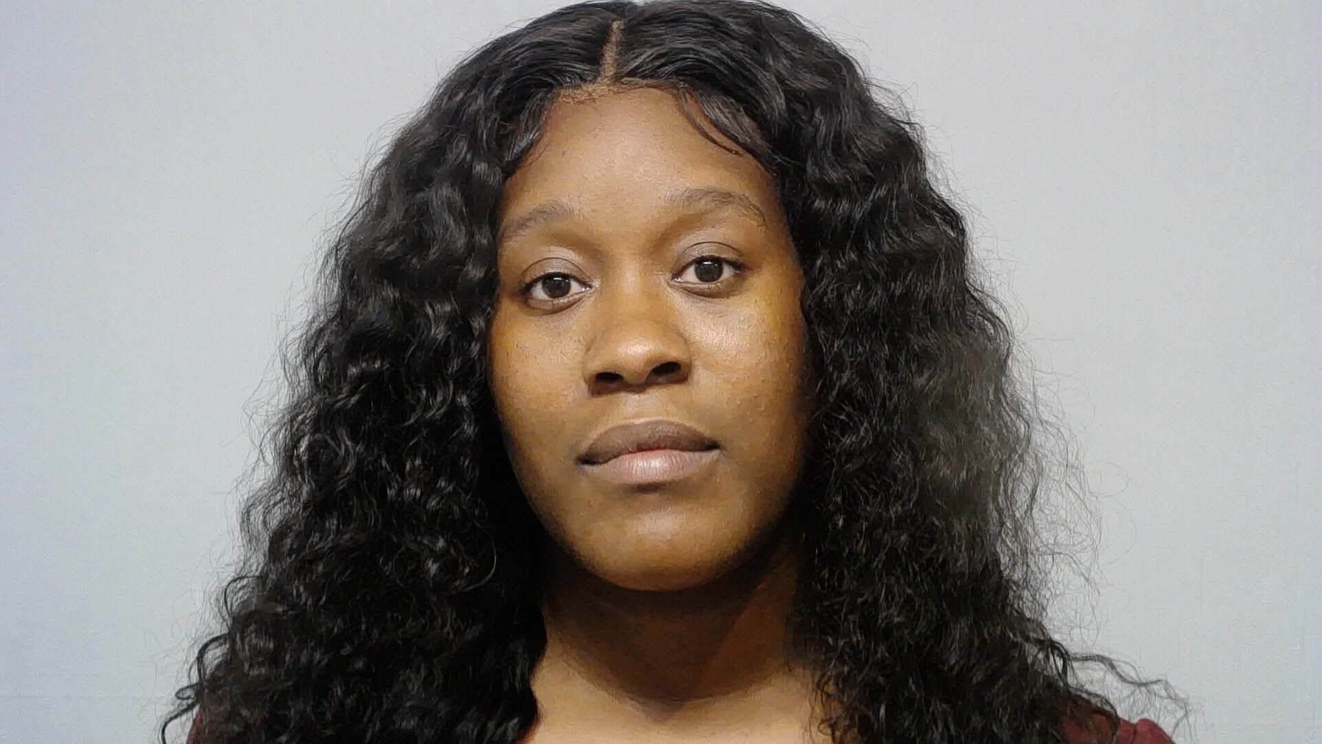 Macon woman arrested, accused of Theft and