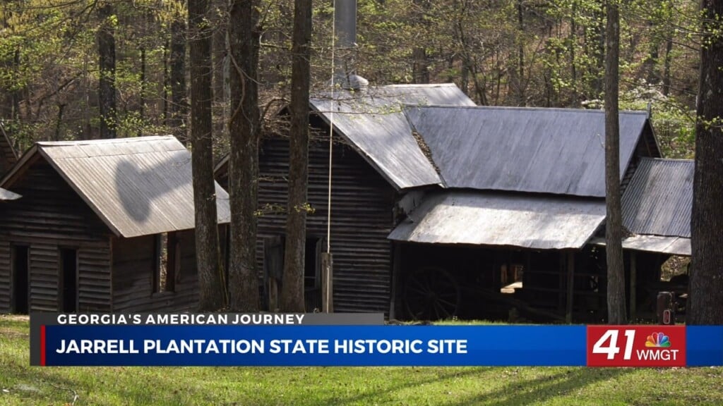 Georgia's American Journey: Jarrell Plantation In Middle Georgia Reveals Life From Slavery To Modern Farming; Wide shot of preserved 19th-century buildings at Jarrell Plantation in Georgia