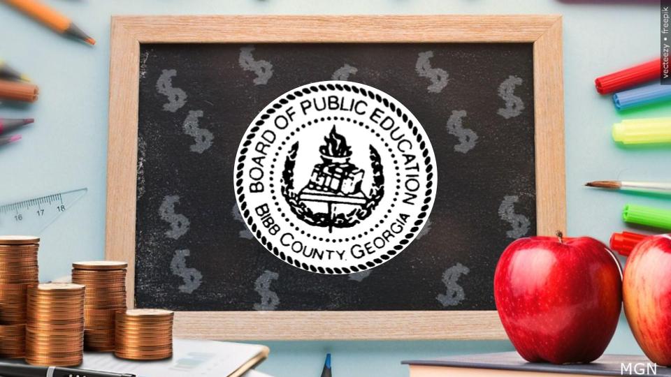 Bibb County School District budget meeting discussing $5M textbook purchase delay