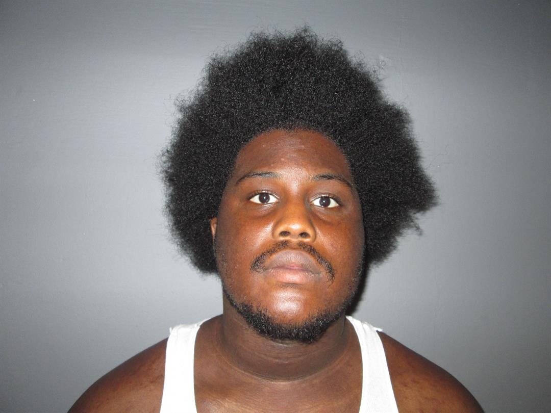 Man arrested after loaded gun found in diaper bag