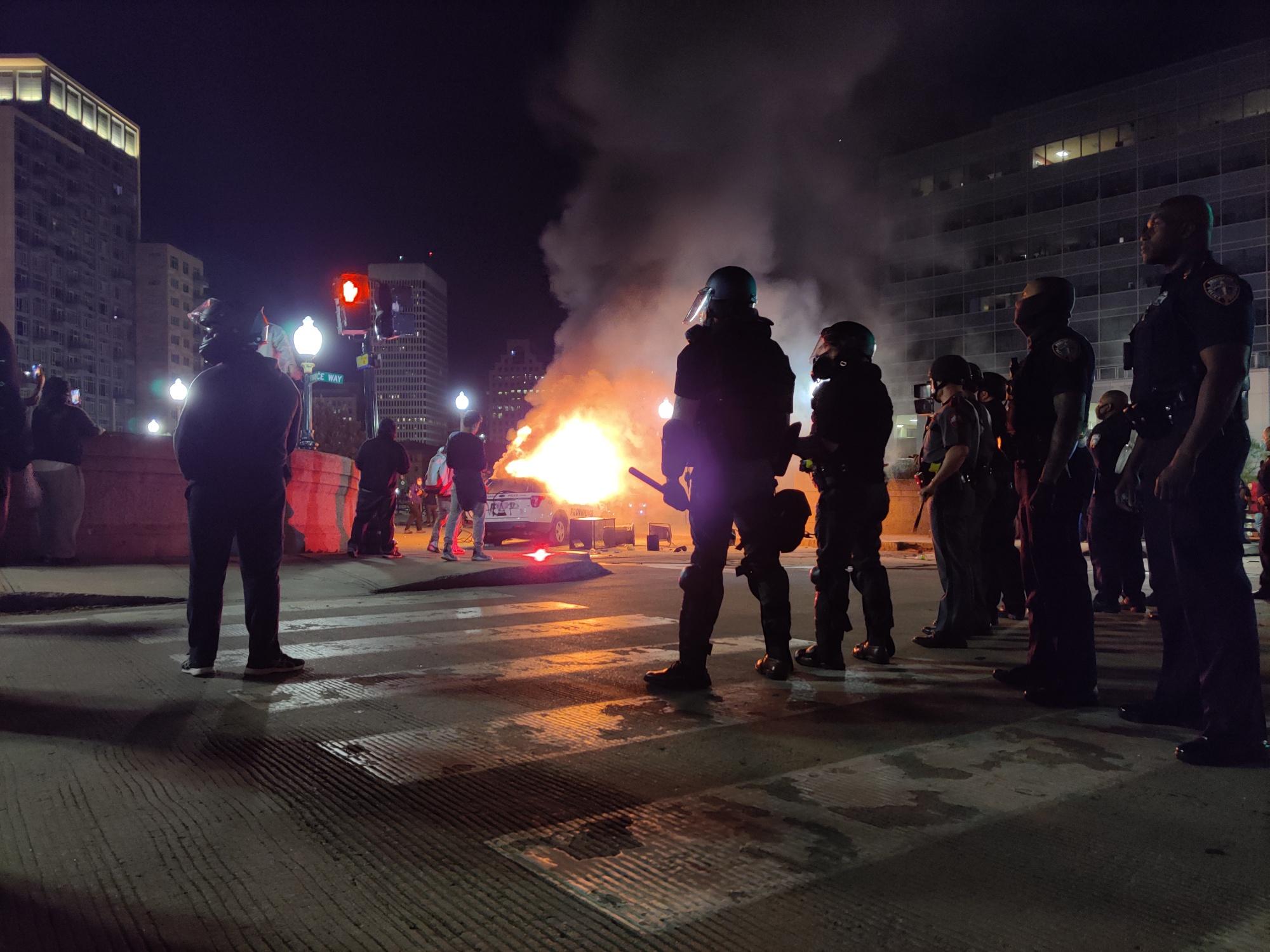 Police SUV in flames as protest turns to riot outside Providence Place ...