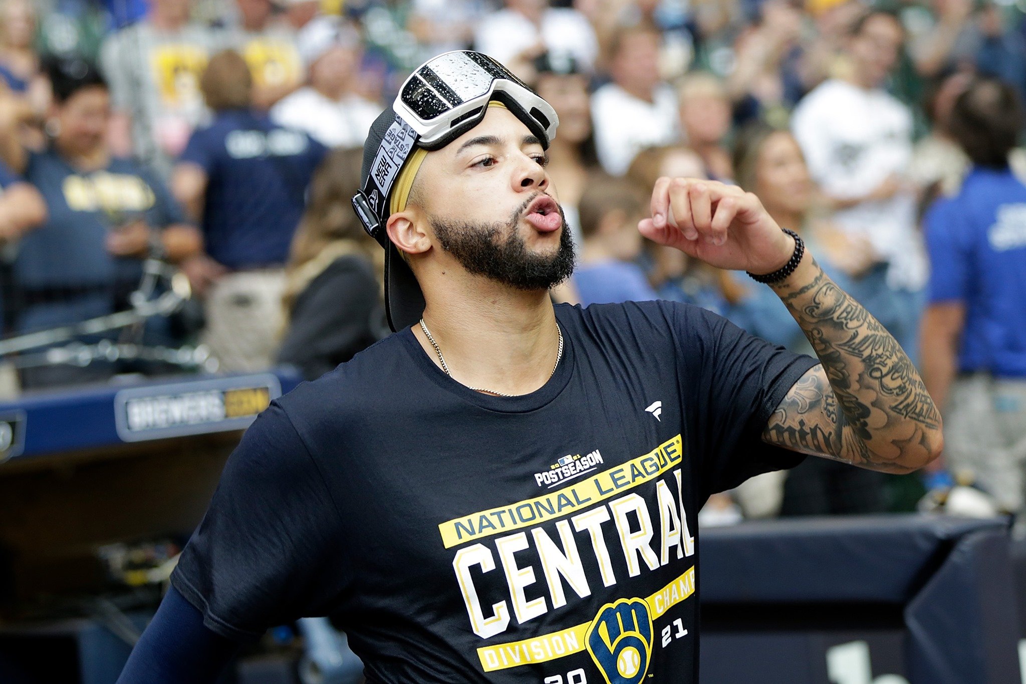 Brewers pitcher punches wall celebrating playoff berth, likely to miss
