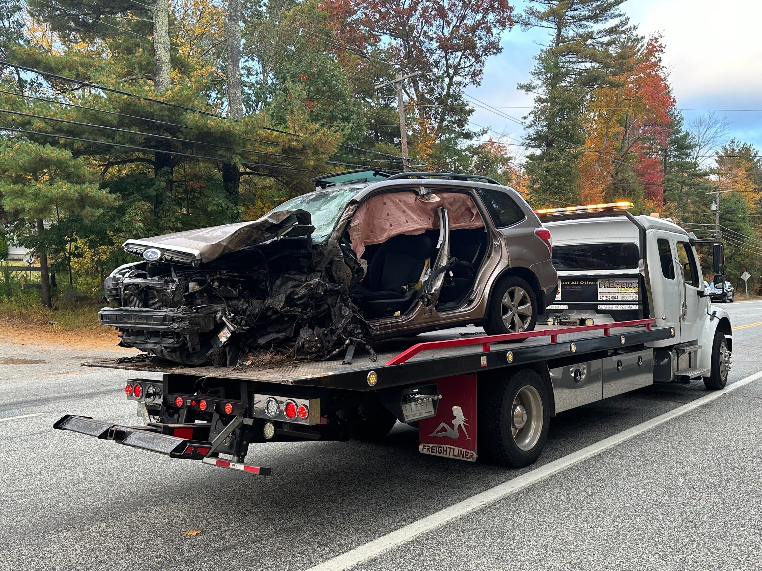 Crash south of Garrett leaves truck on top of car, sends 2 to hospital