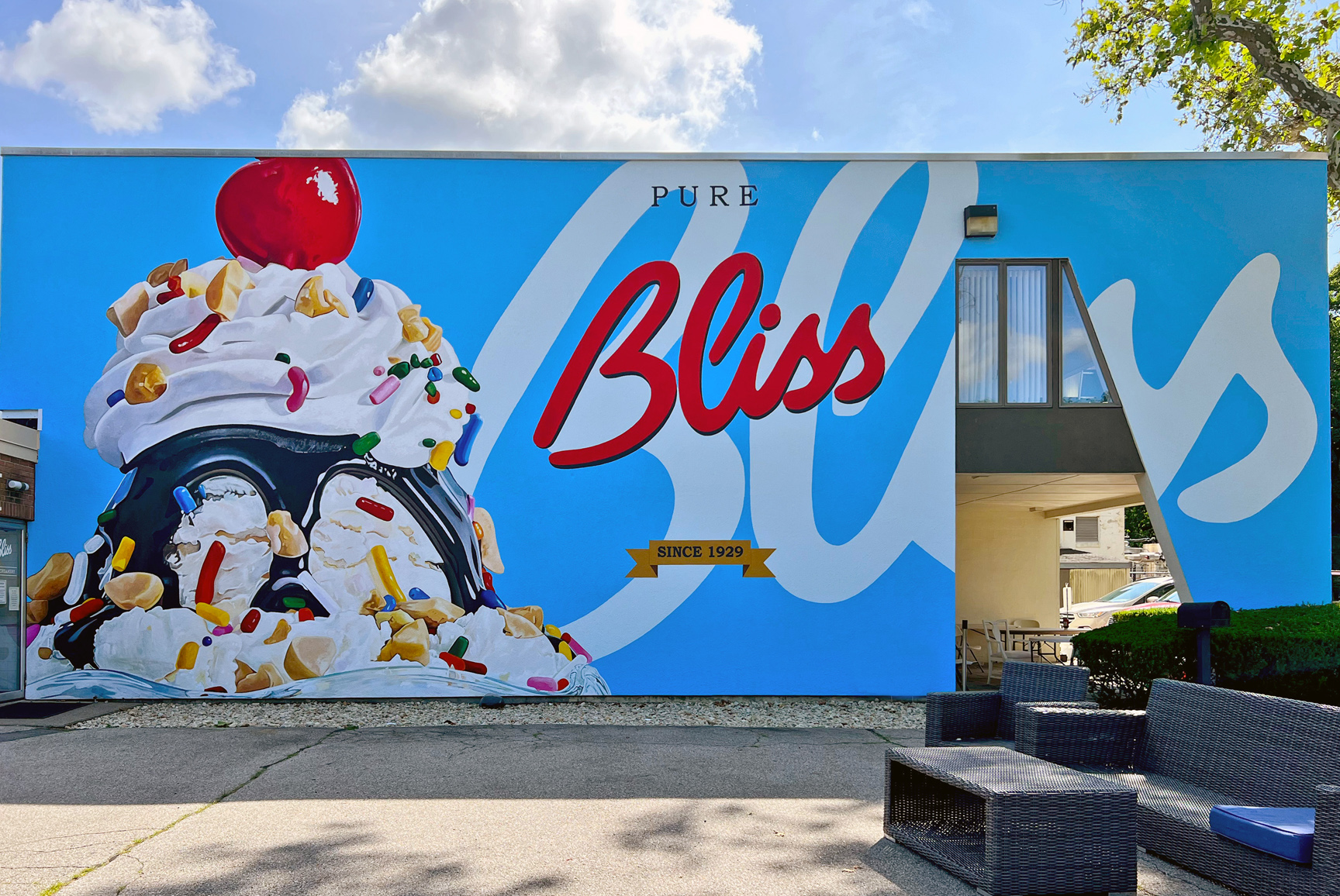 Bliss reveals completed murals at historic ice cream shop ABC6