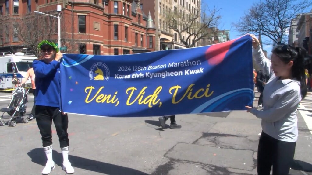Spectators Cheer On Runners At Boston Marathon