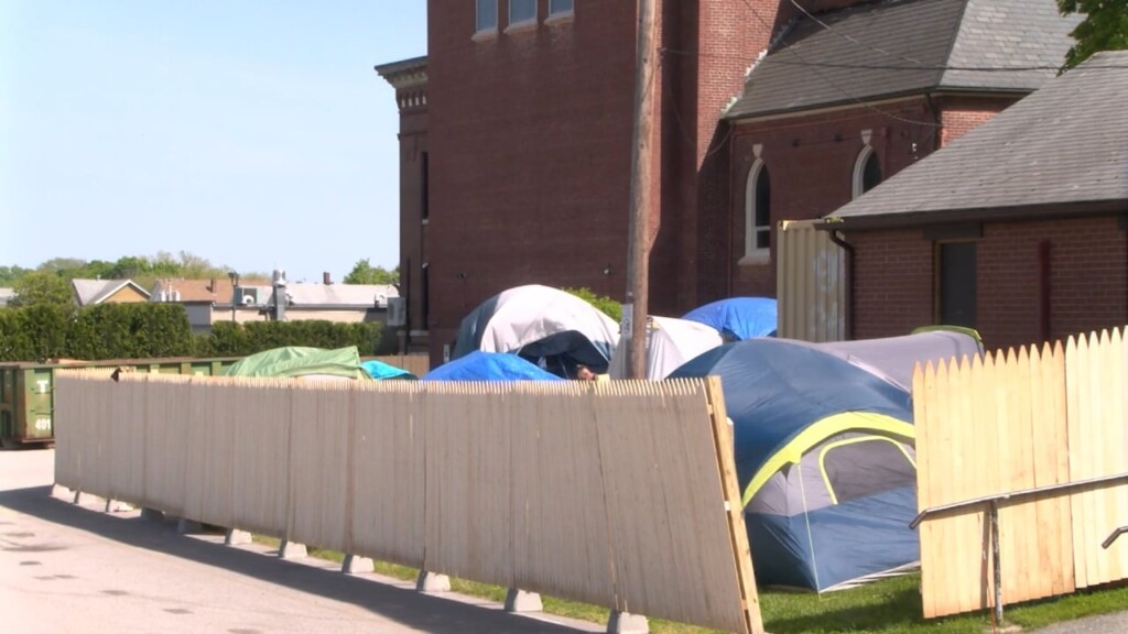 People Displaced From Homeless Encampment Gather At Church In Providence