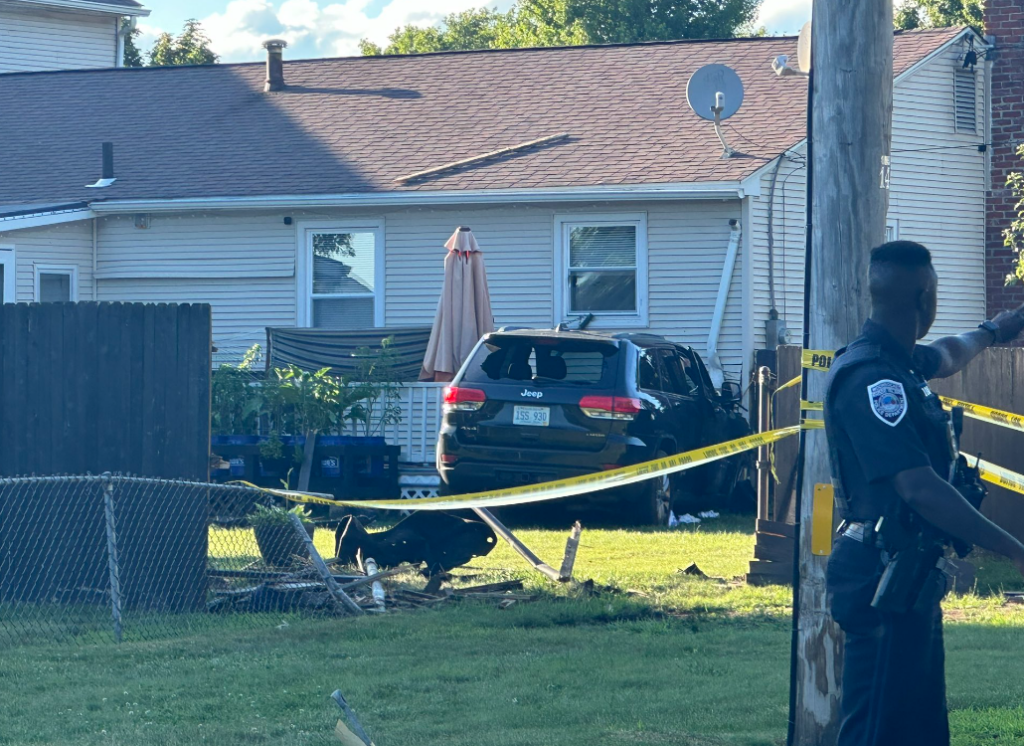 Police establish crime scene after car crashes into Woonsocket home | ABC6