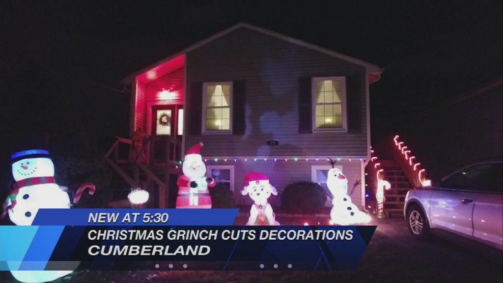 Neighborhood Grinch Cutting Christmas Decorations
