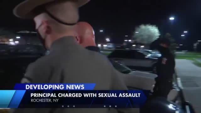 Ny Principal Arrested