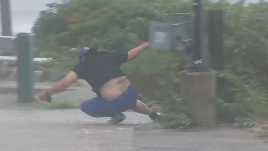 Guy Takes Header In Storm