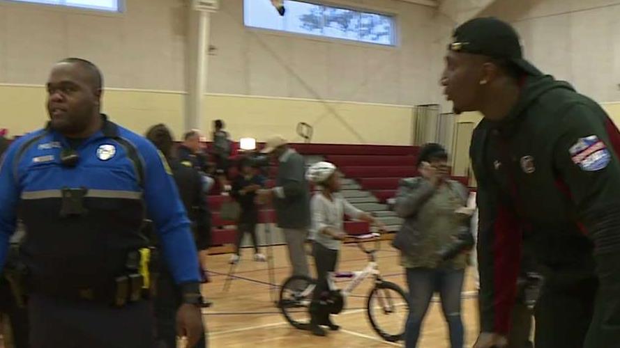 Deebo Samuel helps surprise kids with bikes