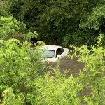 Cola Fire Car In Creek