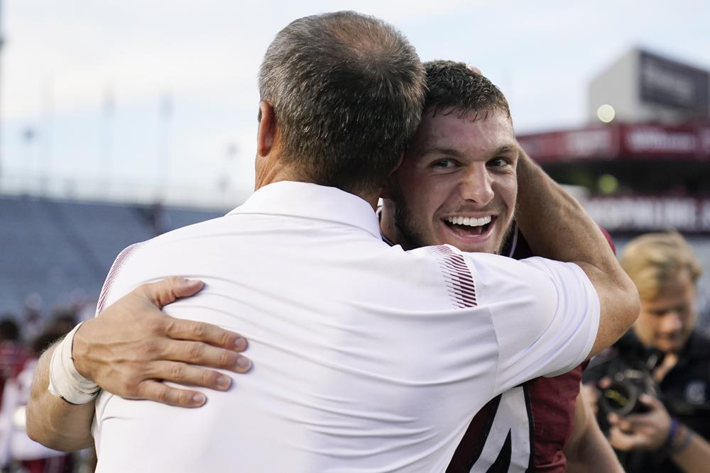Luke Doty Shane Beamer Hug