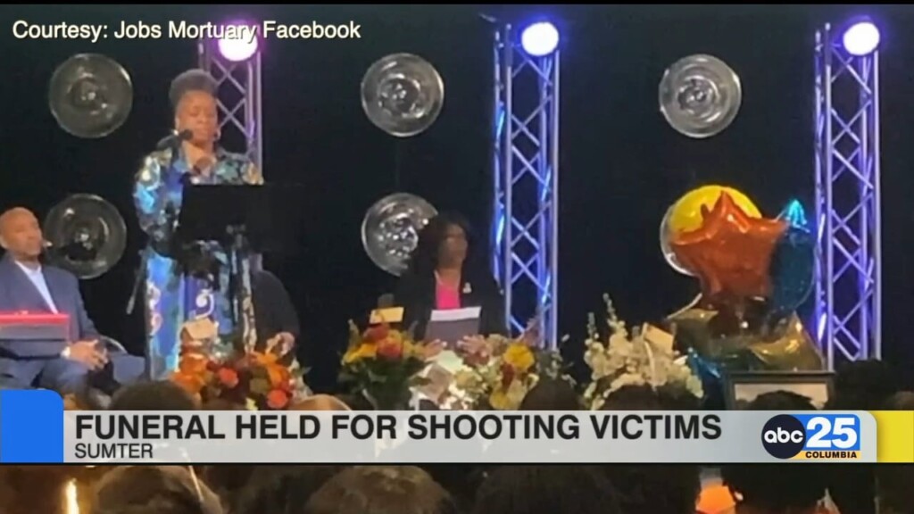 Funeral Held For Shooting Victims