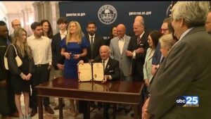 Gov Signing Bill Pkg