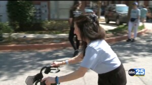 Folks Lace Up Tennis Shoes For Cause