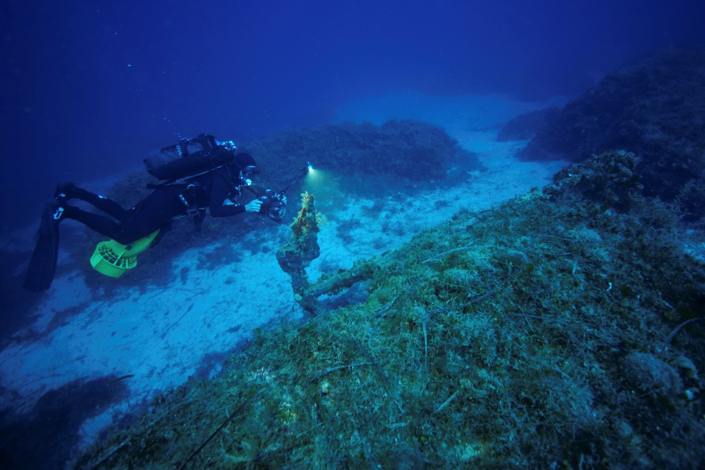Diver, Director And Cinematographer Anastasis Agathos Films An Anchor At A Shipwreck Site On The Island Of Fournoi