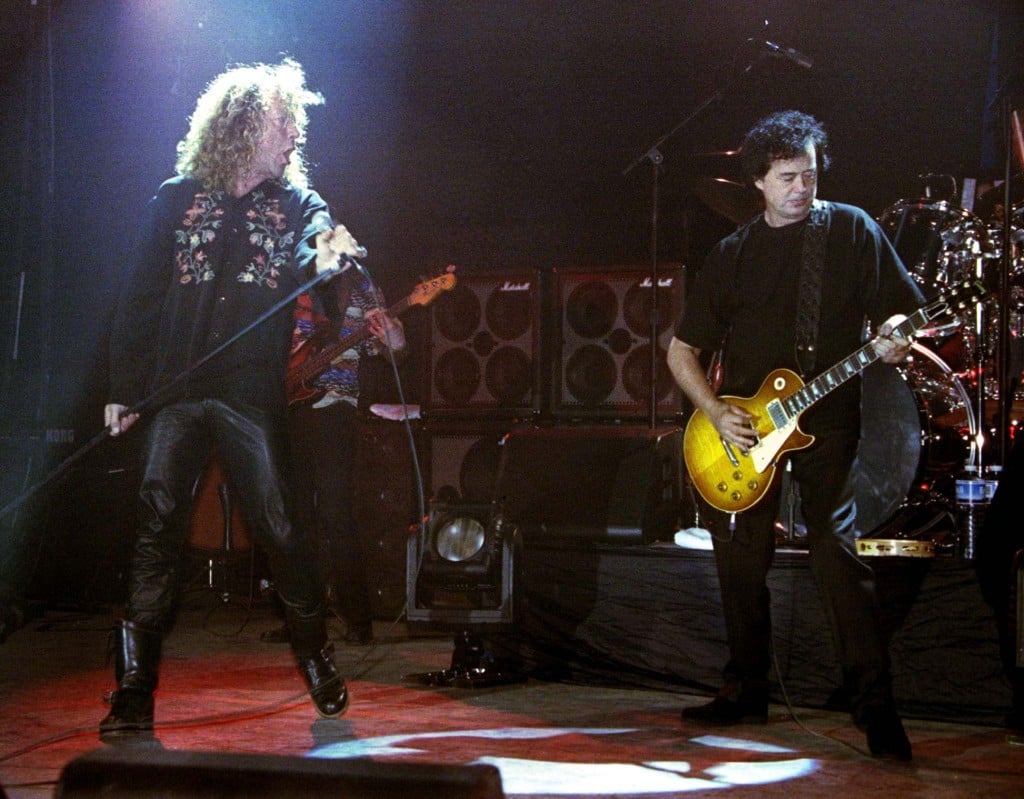 Rock Legends Robert Plant (l) And Jimmy Page (r) Perform On The Stage During A Concert In Istanbul M..