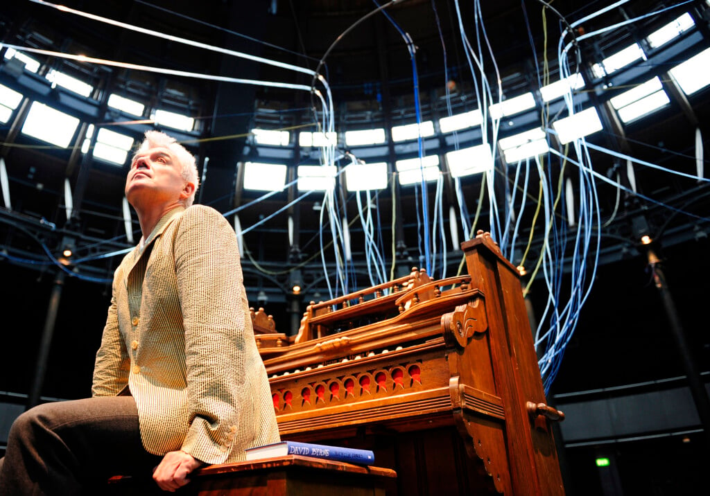 U.s. Musician Byrne Sits Within His Musical Installation At The Roundhouse In London