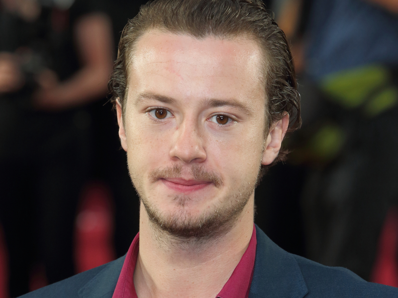 Joseph Quinn Set To Portray George Harrison In Beatles Biopics