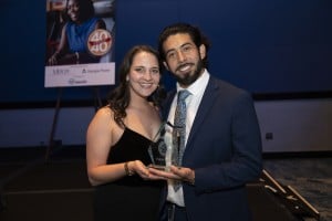 Couple Dressed Up Holding Award As One Is An Honoree For The Georgia Trend 40 Under 40 Awards
