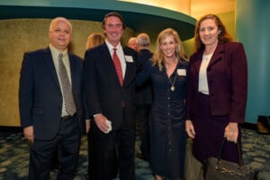 2023 Most Influential Georgians event witht four people standing and smiling