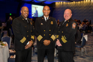 Three men in formal uniforms from fire department at the 2023 Most Influential Georgians