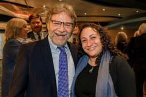 Two people smiling at camera at the 2023 Most Influential Georgians