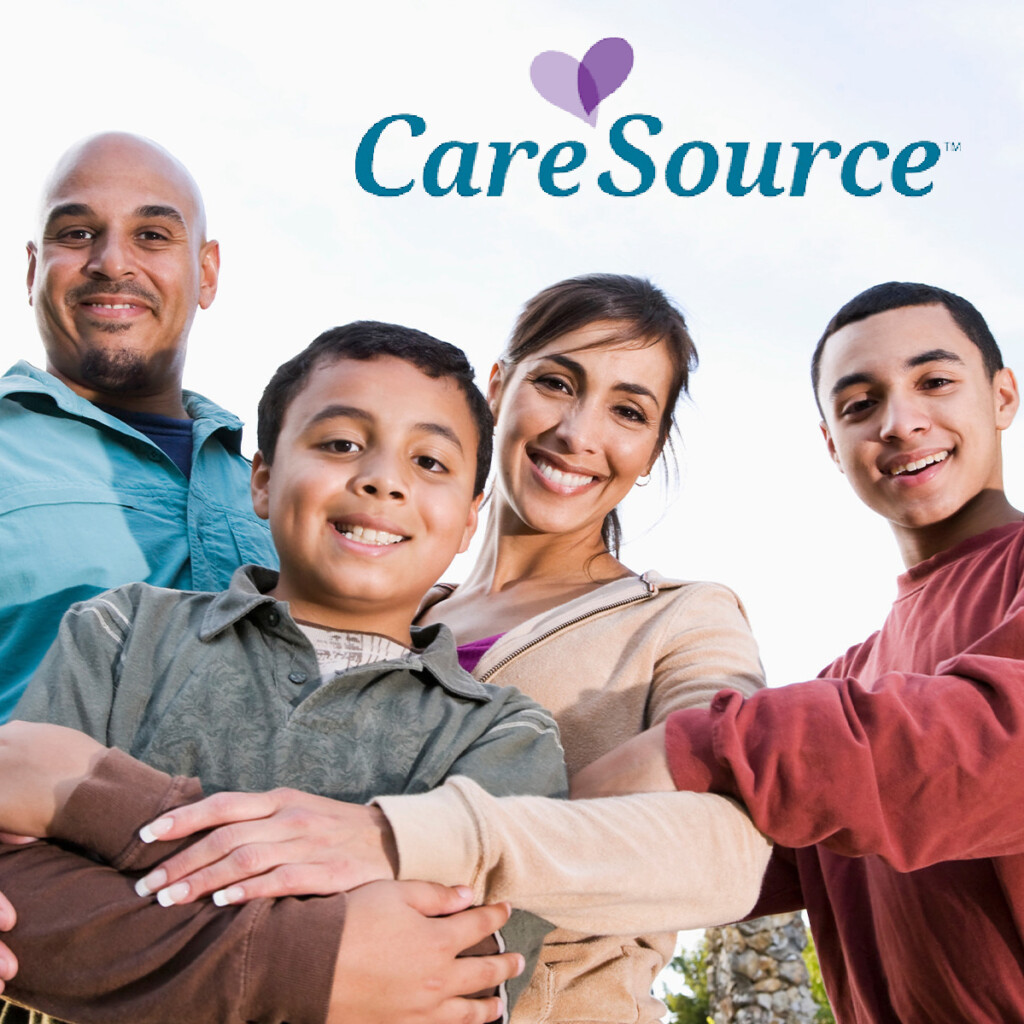 CareSource Family of four smiling at camera with CareSource logo at te top