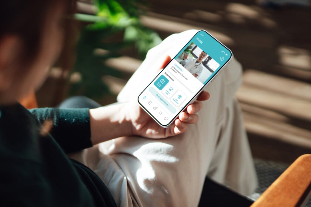 Young Woman Having A Virtual Medical Appointment Via Smartphone