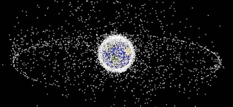 A representation of satellites and large debris in orbit. The cluster near the Earth are satellites in low orbit, while the outer ring represents geosynchronous satellites – those whose orbit follows the Earth’s rotation, so they always remain above the same part of Earth. Photo: Air Force Research Laboratory 