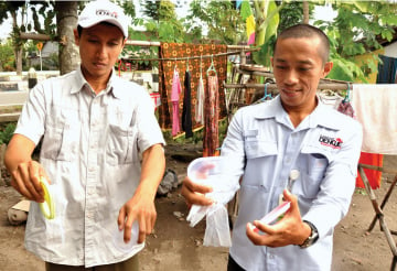 Mosquitoes with Wolbachia are released during a test in Yogyakarta, Indonesia in 2014. The Wolbachia bacteria is intended to render mosquitoes incapable of transmitting diseases to humans. Photo Courtesy: Eliminate Dengue