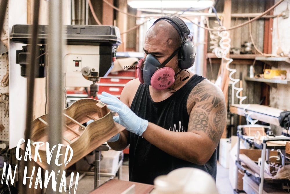 Craftsman Dennis Hermano builds an ukulele at KeAloha Ukulele. Owner Alan Okami says the company's local values are an essential element of the instruments they produce. Aaron K. Yoshino