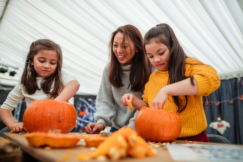 pumpkin-carving-with-family-fall-season-october-halloween