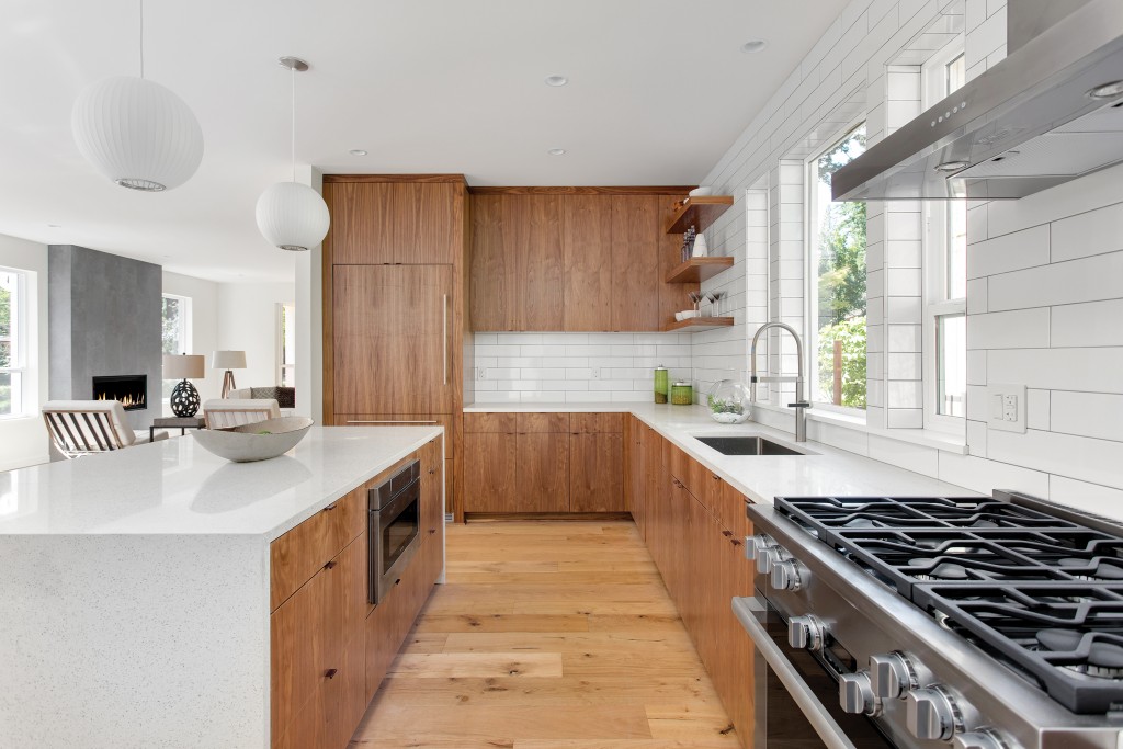 Beautiful Kitchen In New Luxury Home With Island Pendant Lights