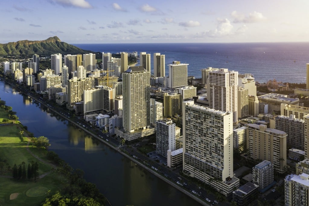 Tall Buildings At Waikiki Beach And Wai Canal In Honolulu, Hawaii