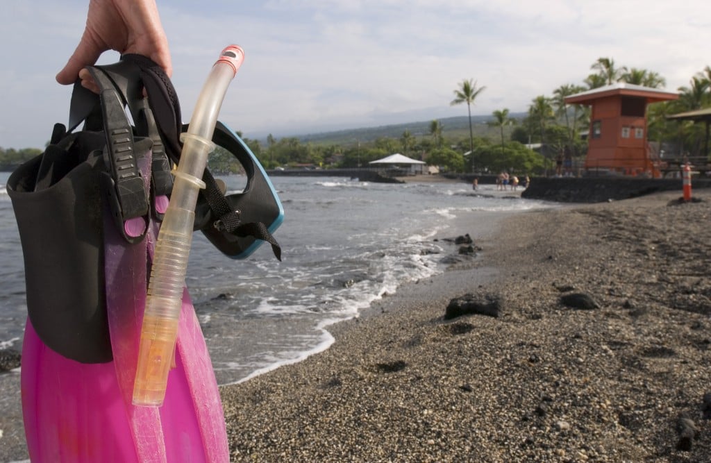 Snorkler a Kahaluu Beach Park, Kona Hawaii 