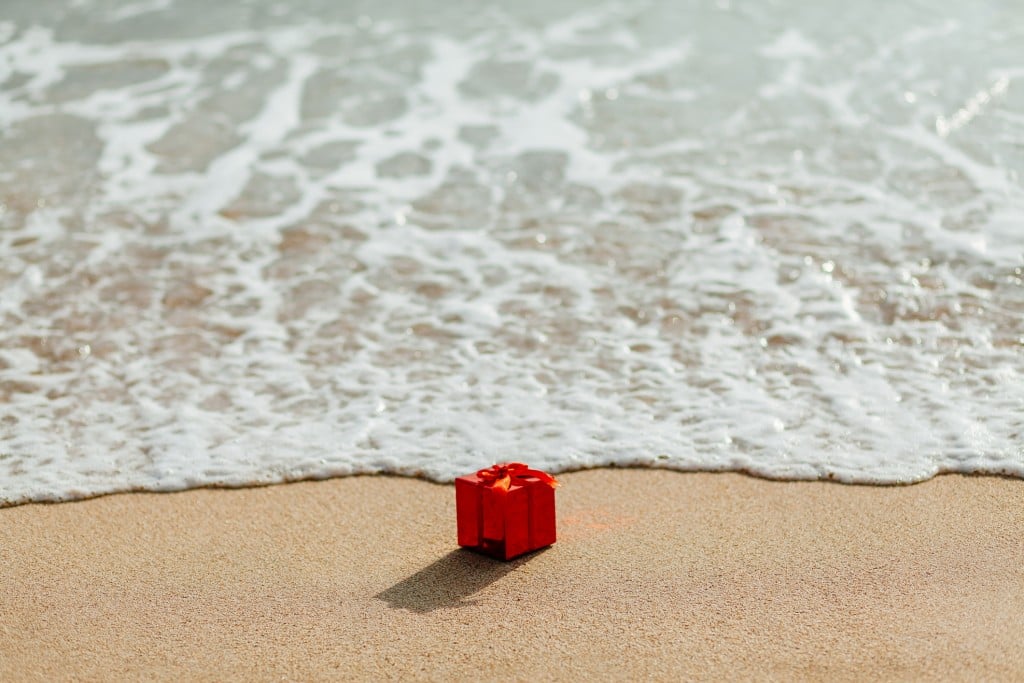 Gift Red Box On The Beach