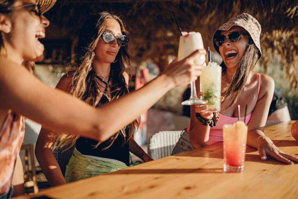 Friends In A Bar On The Beach