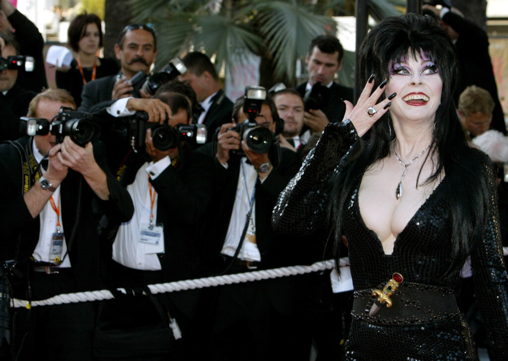 Gothic Actress Elvira Poses For Photographers During Red Carpet Arrivals At The 56th International F..