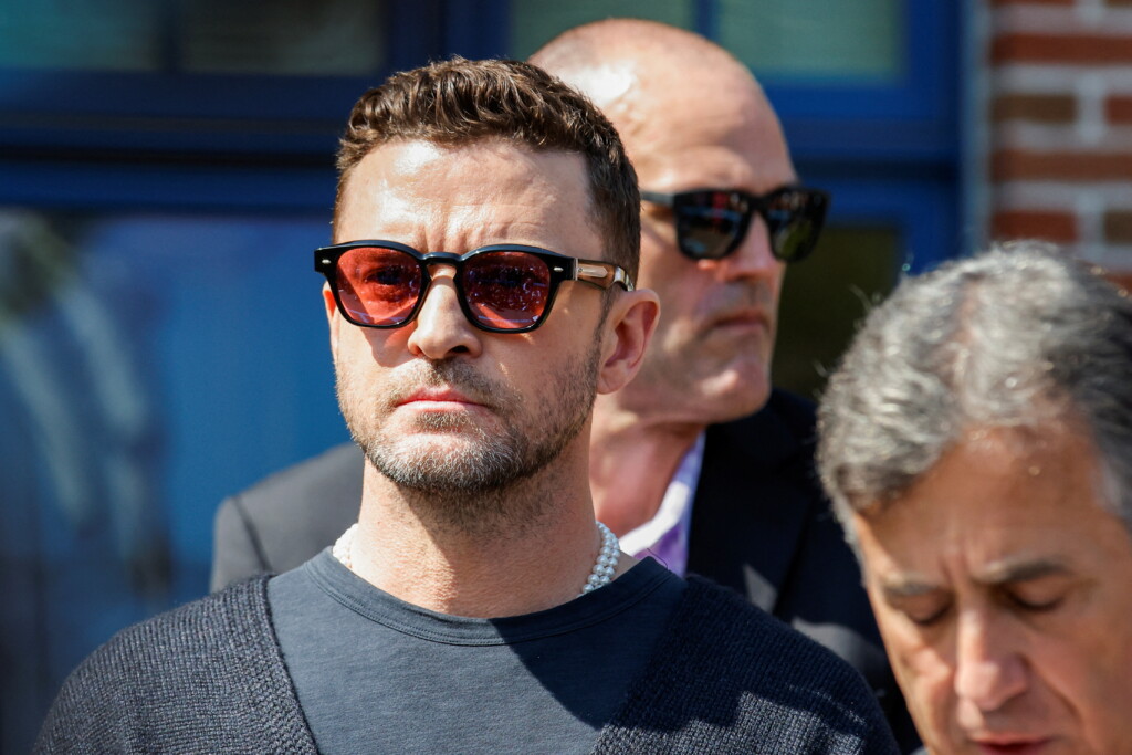 Singer Justin Timberlake Waits To Address The Media After His Appearance In Court In Sag Harbor, New York